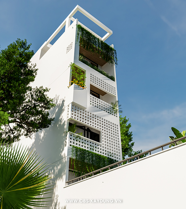 Chi tiết mặt tiền sử dụng gạch bông gió lọc ánh sáng tự nhiên, giảm chói và nhiệt.